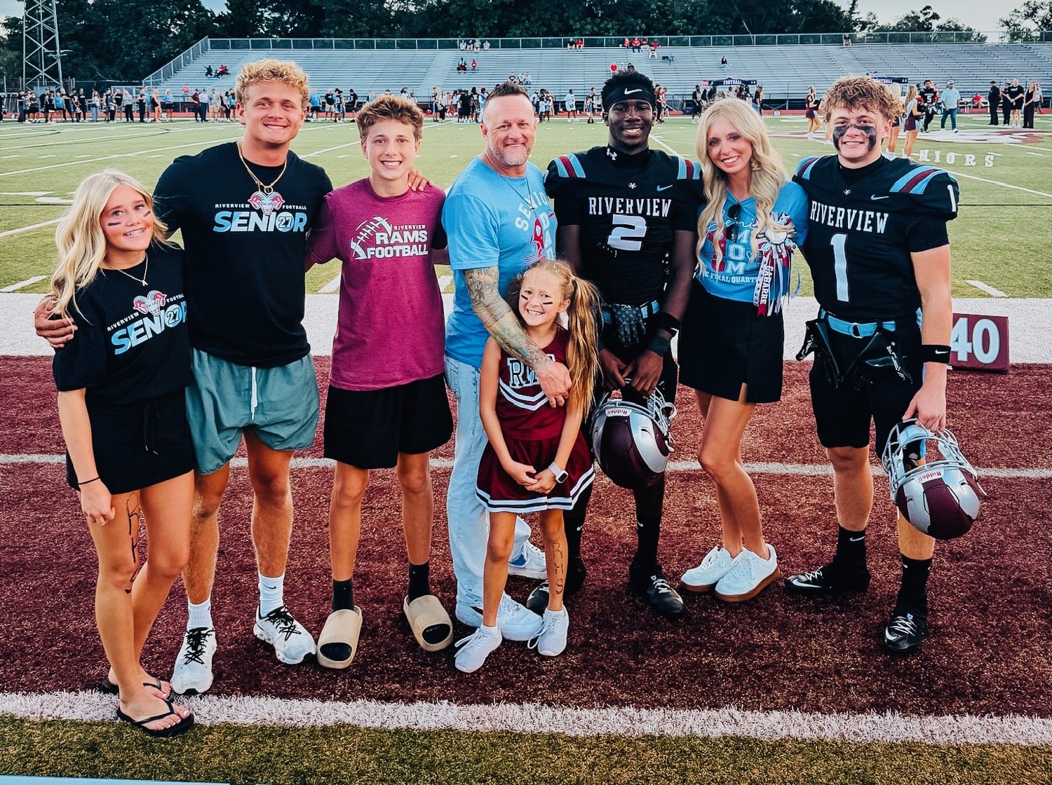 The Clough family at a Riverview High School football game in Sarasota, FL